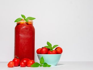 red tomato with jar